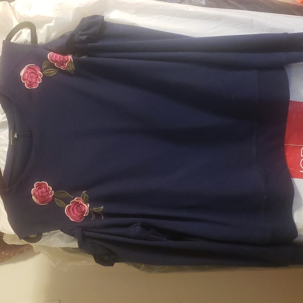 Relativity Sweater with cut off shoulders, dark navy with rose detailing.